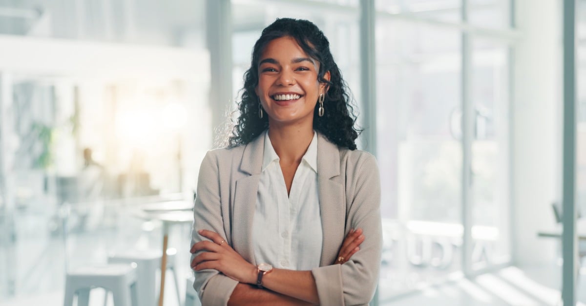 Employee happy after reading TruePlan's April 2026 Benefit Brief on compliance deadlines and HR planning tools 